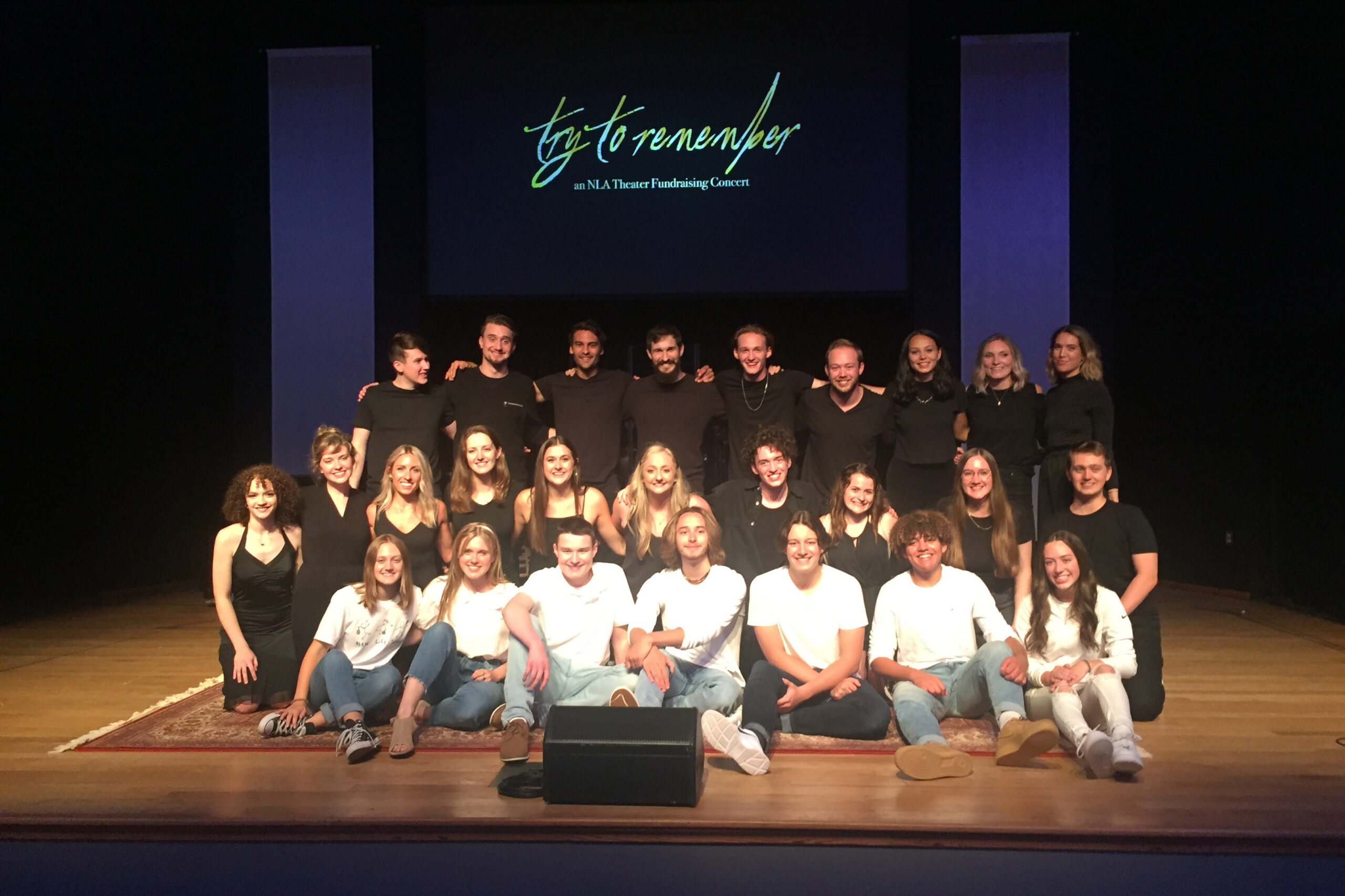 New Life Academy alumni performing on stage during the theater alumni concert.