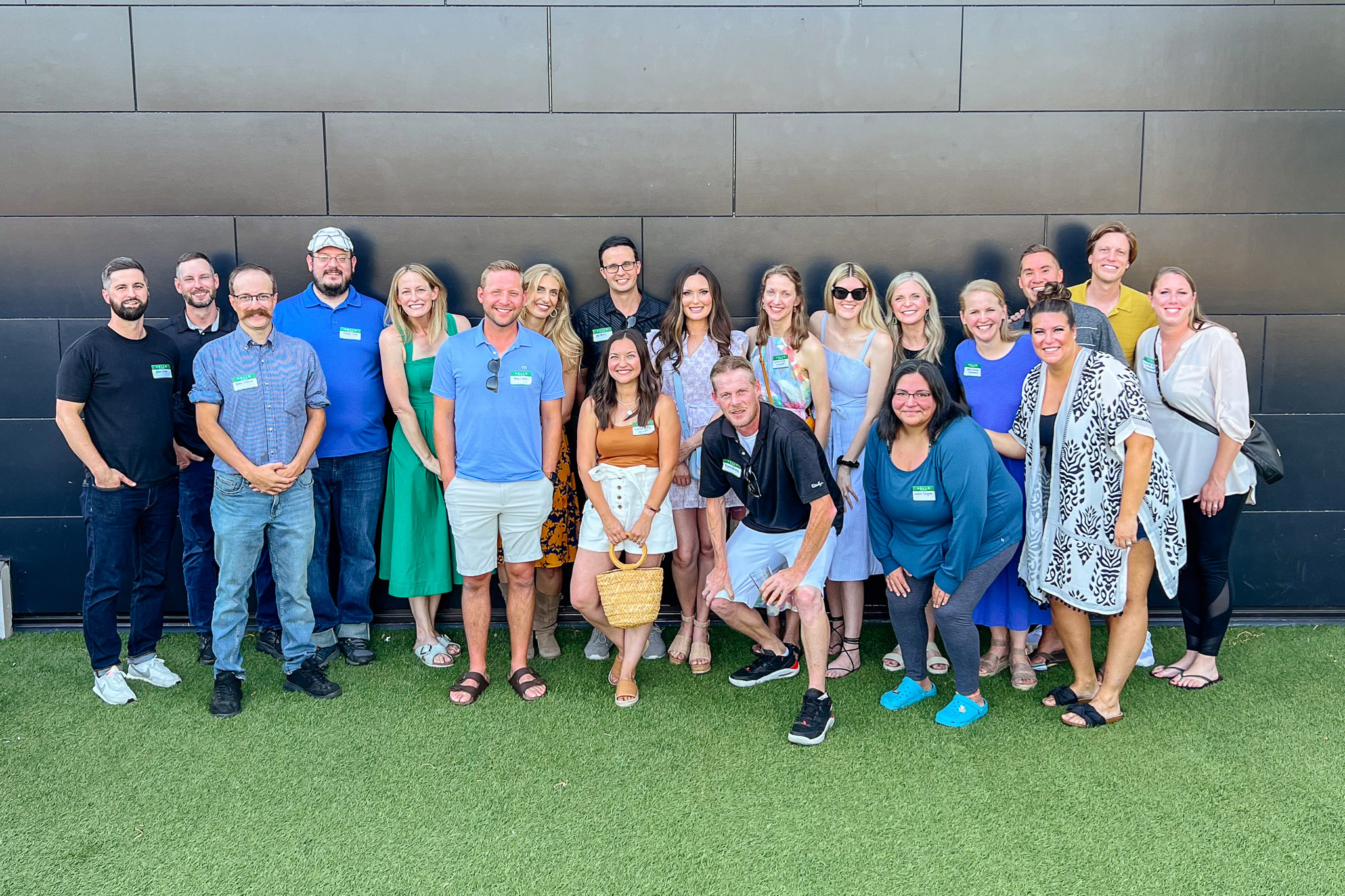New Life Academy alumni standing together outdoors for a group photo during a class reunion event.
