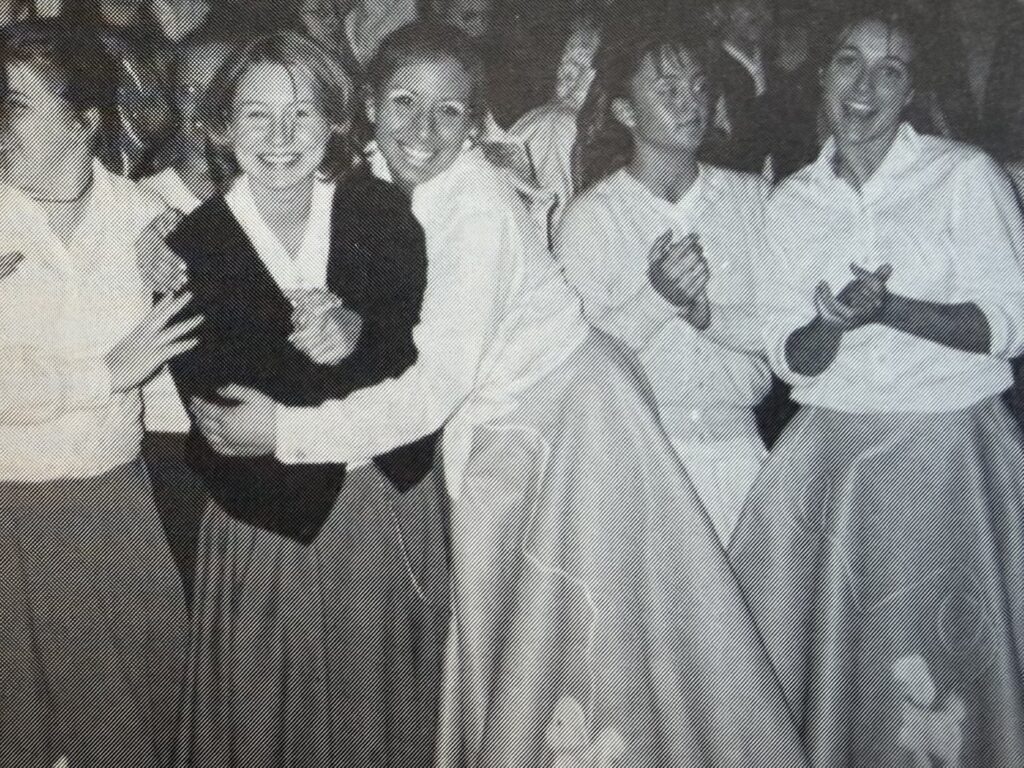 New Life Academy students celebrate during Spirit Week at one of the school's early Decade Dance events.