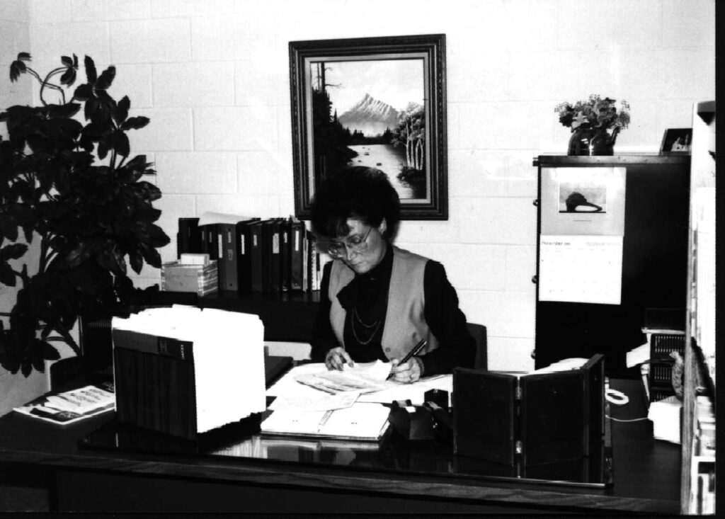 Patti Wiens working in her office after being named Head Administrator of New Life Christian School.