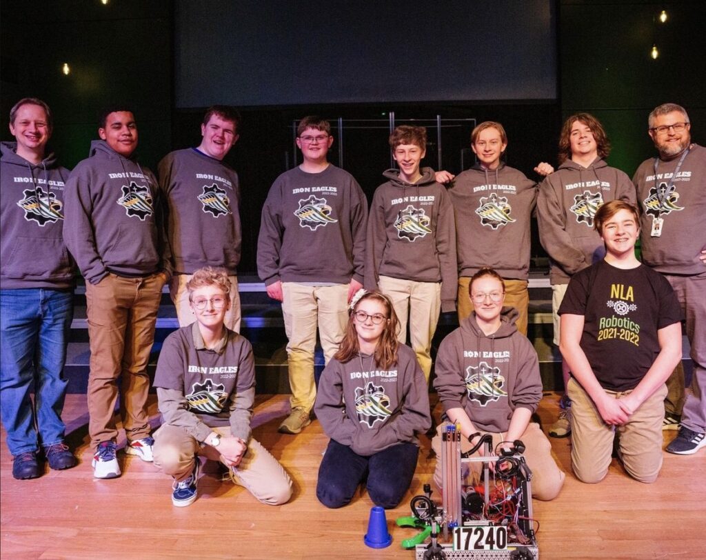 New Life Academy Iron Eagles Robotics Team celebrates its first appearance at the Minnesota State Robotics Tournament.